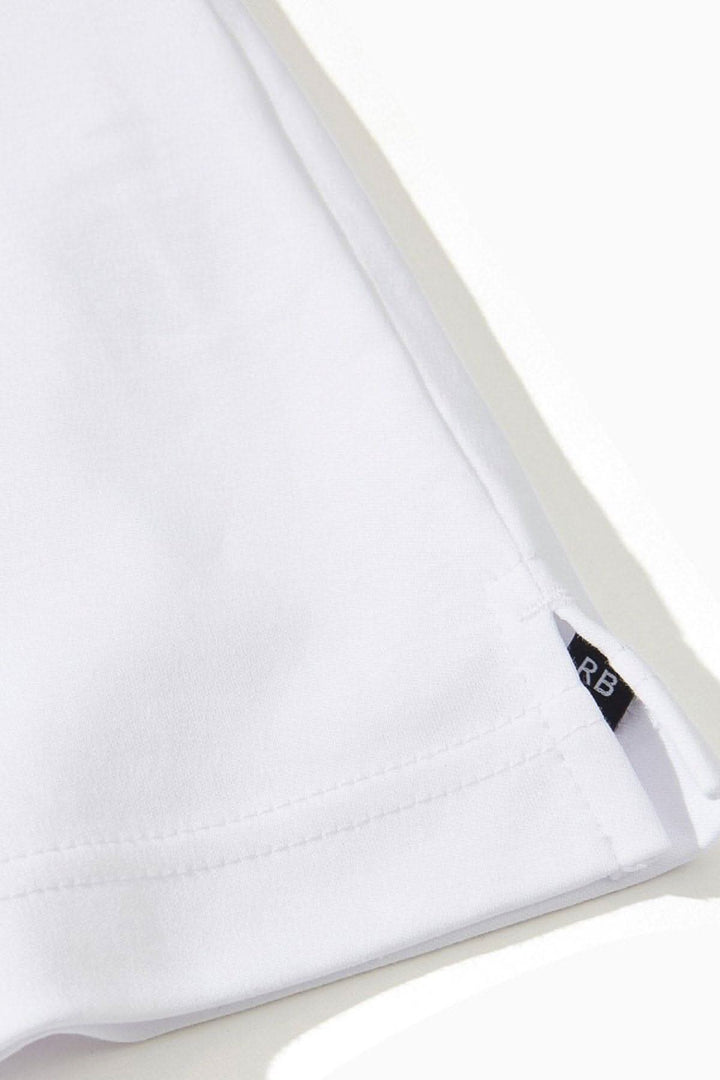 Détail du chandail manches longues "Le Barakett" en coton Pima, montrant l&