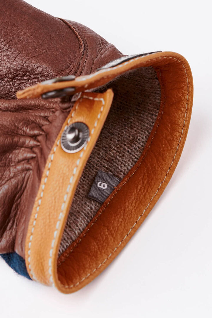 Gant en daim avec doublure chaude en laine et détails en cuir de chèvre. Idéal pour l'hiver.