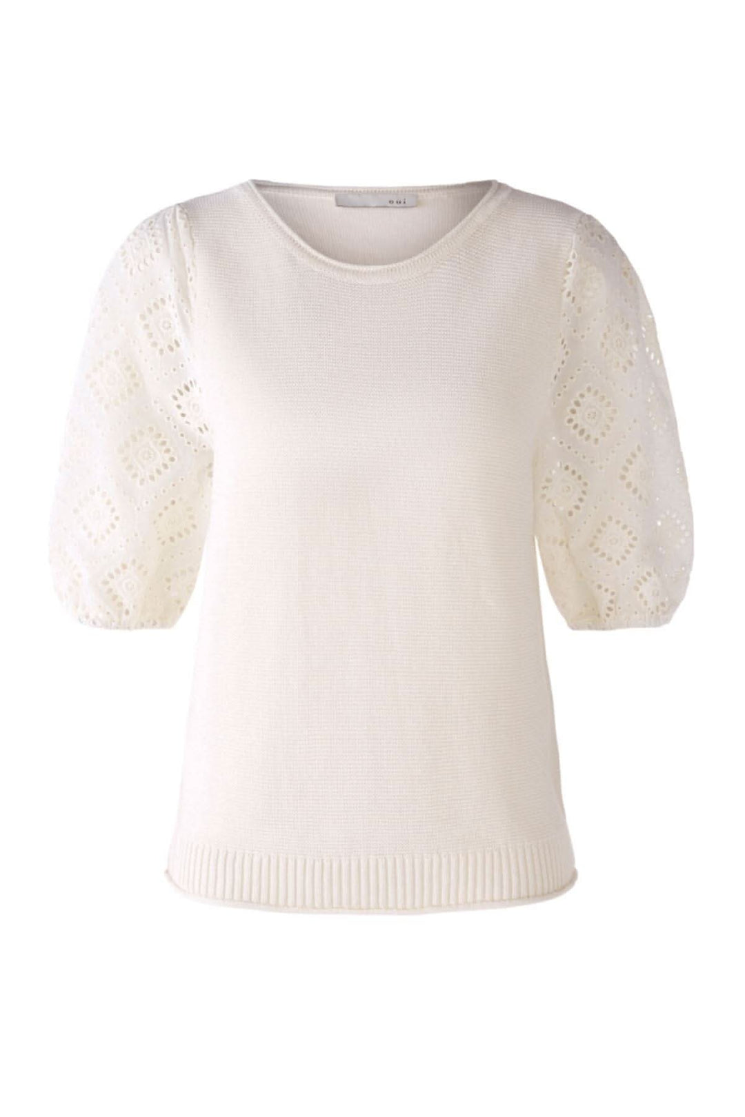 Haut à manches courtes avec broderie en dentelle anglaise couleur blanc cassé, style féminin et élégant.