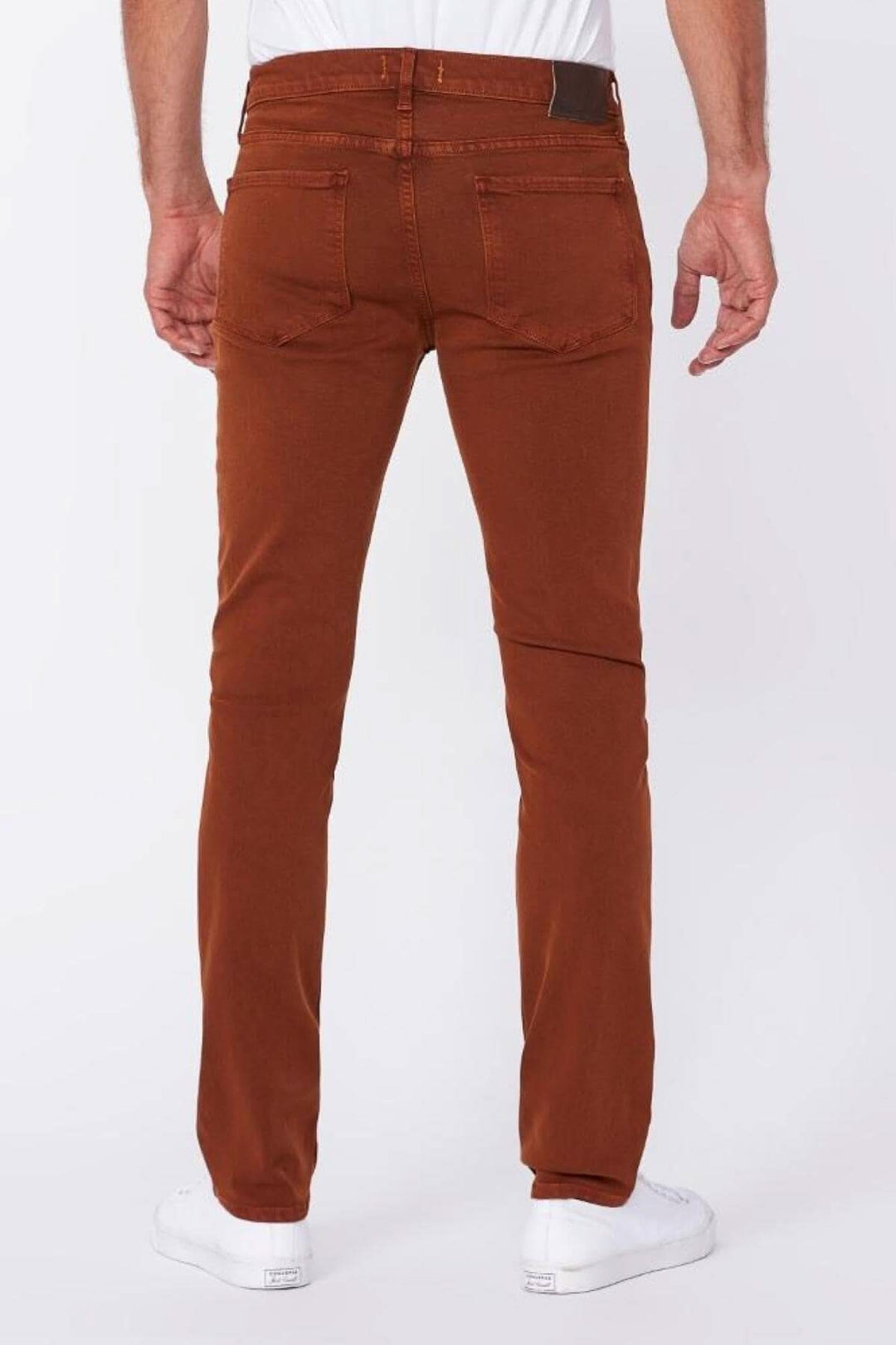 Jean Paige Lennox slim fit pants in Deep Russet orange, showcasing back view and comfortable denim style.