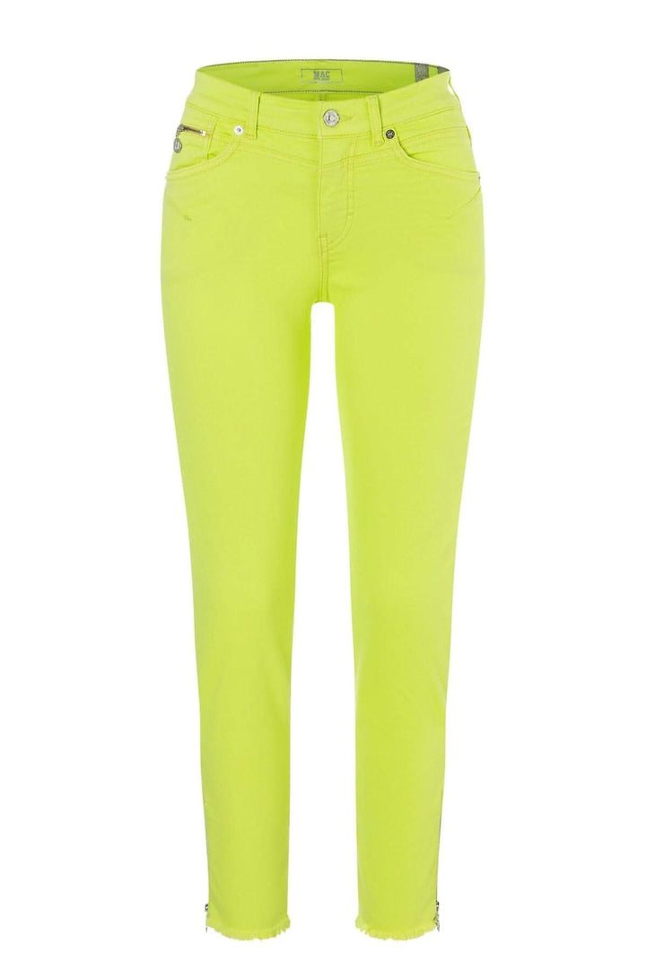 Jean vert fluo slim chic avec revers éffiloché et fermeture éclair dorée, en denim stretch.