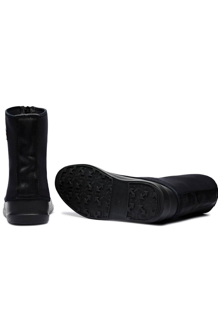 Bottes noires Le Mobster avec tige en néoprène et semelle en caoutchouc naturel pour une adhérence optimale.