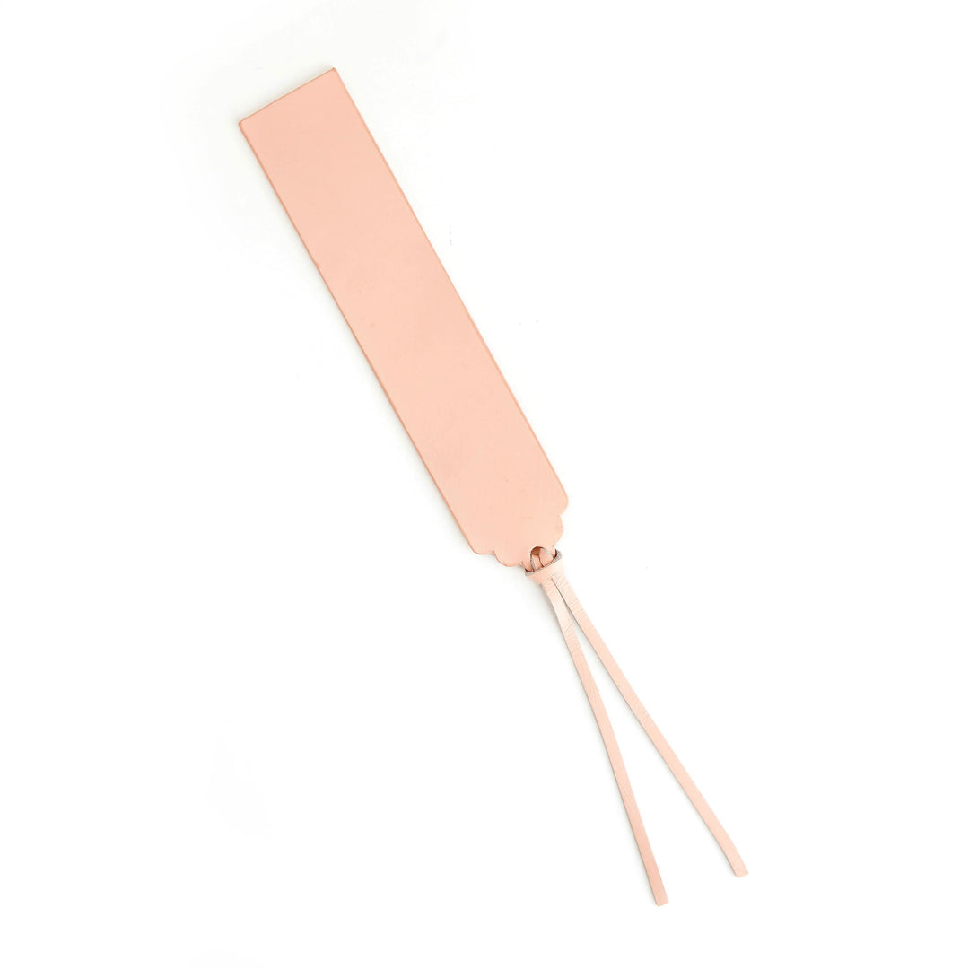 Handmade American leather bookmark in soft pink, featuring elegant design and personalized monogram options.