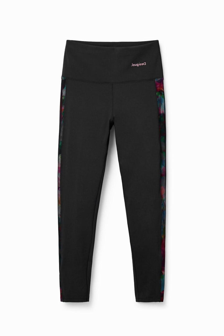 Legging sport taille haute noir avec bande latérale en filet floral, parfait pour le sport et les activités physiques.