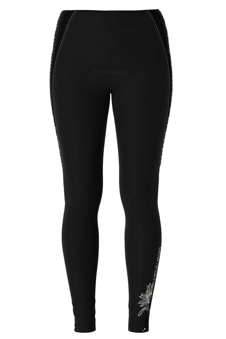 Legging sport noir Marc Cain avec motifs perforés et logo marguerite sur le mollet gauche.