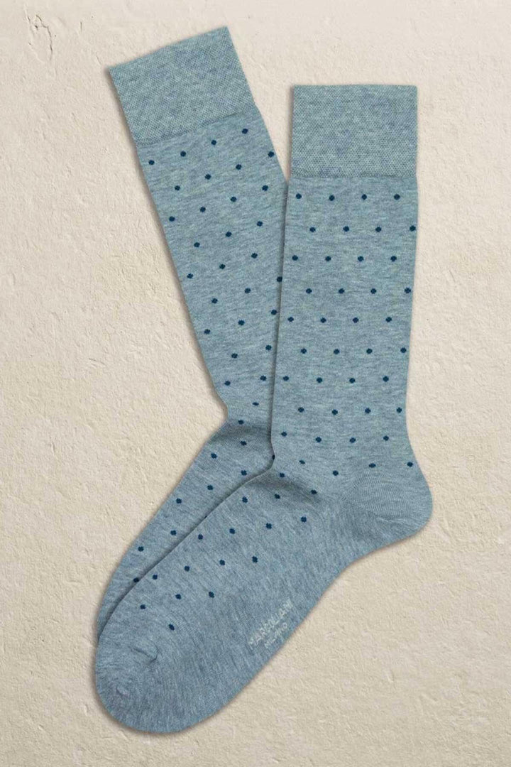 Chaussettes italiennes Marcoliani en coton bleu avec pois, style moderne et élégance.