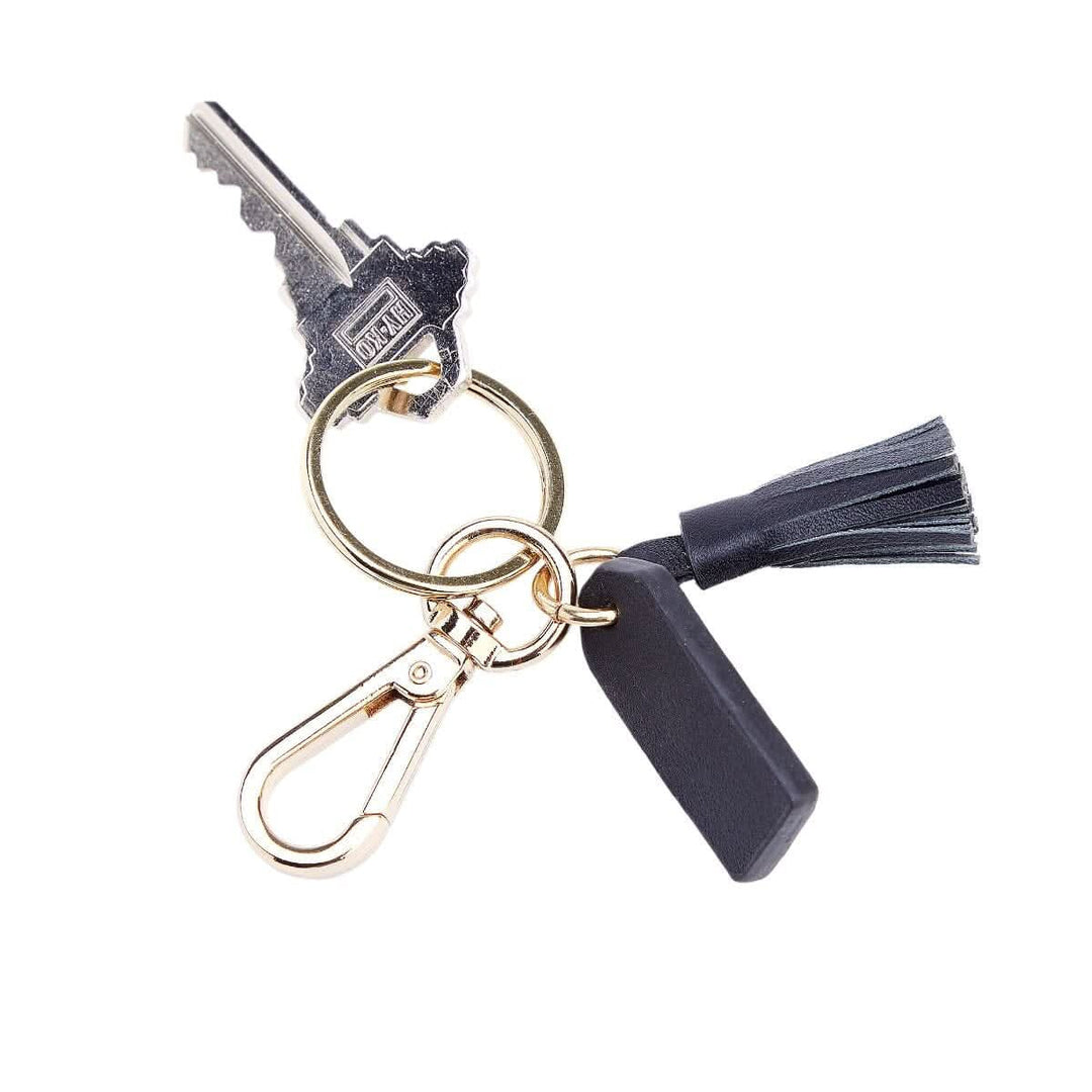 MINI TASSEL KEY FOB featuring a goldtone key ring, tassel, and handmilled hardware – a stylish key organizer.