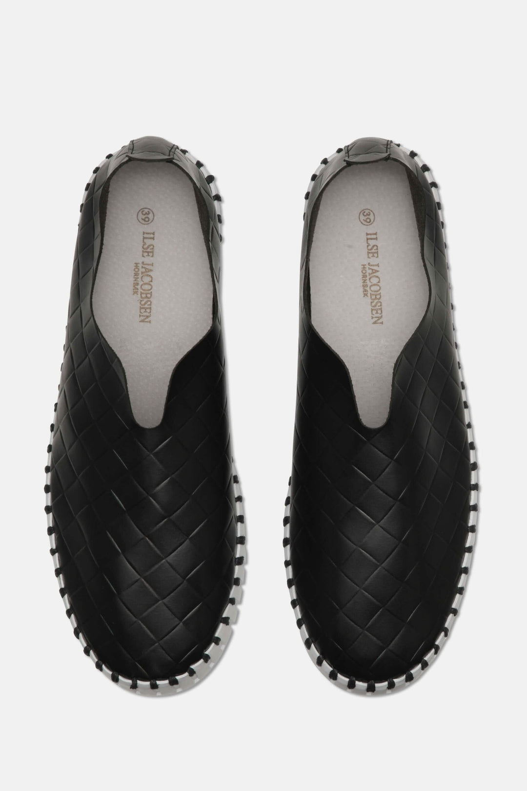 Mocassin tulipe noir en cuir verni avec tige en microfibre et semelle en caoutchouc, confort et style.