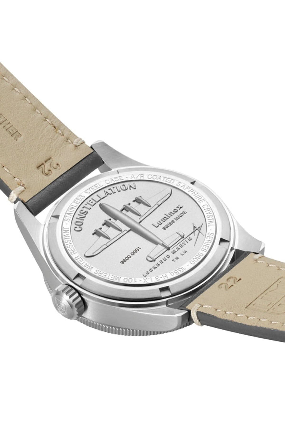 Montre Constellation 9602 avec cadran et bracelet en cuir gris, affichant son fond gravé.