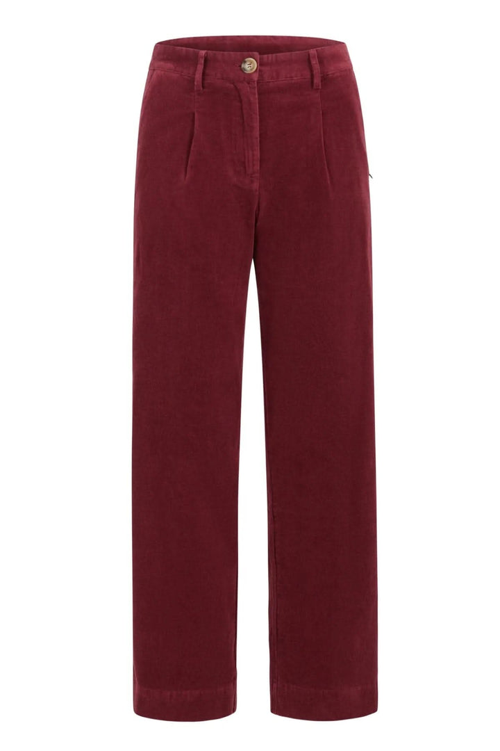 Pantalon Petra en velours côtelé bordeaux, jambes larges et poches, style décontracté et original.