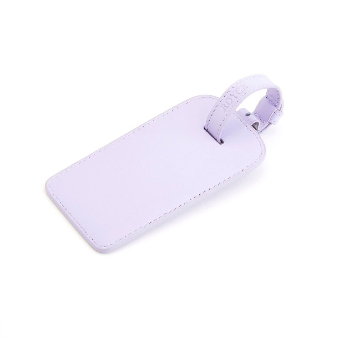Étiquette à bagages en cuir américain lavande, élégante et pratique pour voyager avec style.