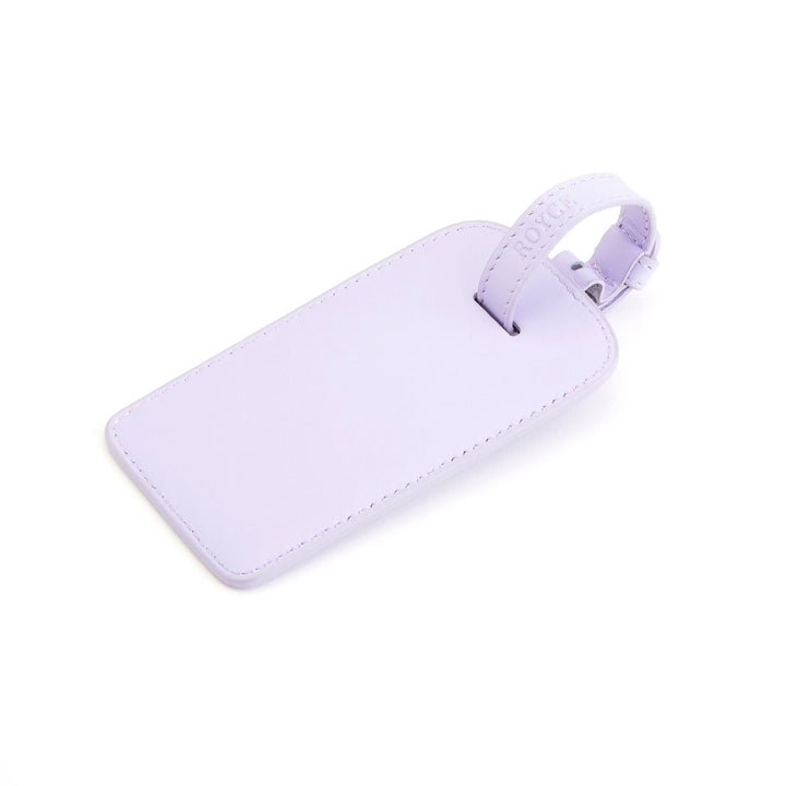 Étiquette à bagages en cuir américain lavande, élégante et pratique pour voyager avec style.