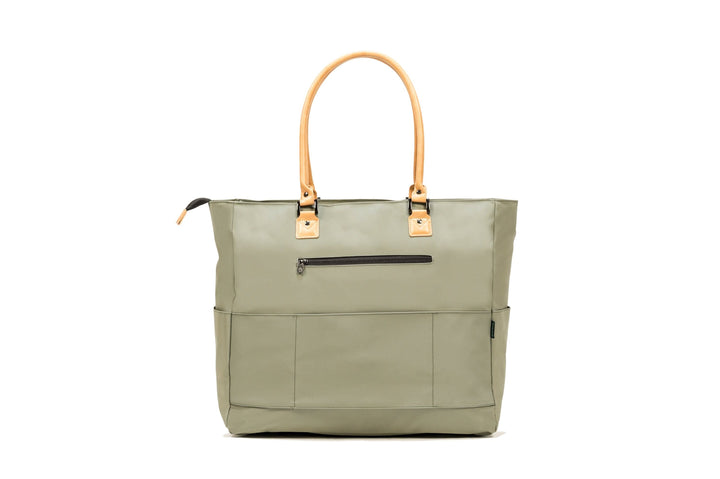 PKG Georgian 33L recycled tote bag in olive green, featuring faux leather handles and multiple pockets for travel convenience.