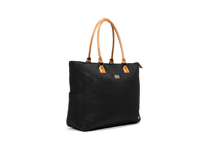 PKG Georgian recycled 33L tote bag with faux leather accents, weather-resistant fabric and padded base, ideal for travel.