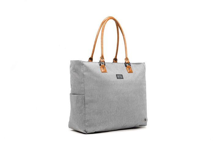 PKG Georgian 33L recycled tote bag in gray with faux leather handles, ideal for travel and overnight trips.