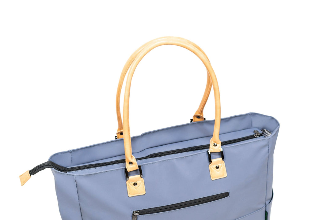 PKG Georgian 33L tote bag featuring weather-resistant fabric and stylish faux leather accents.