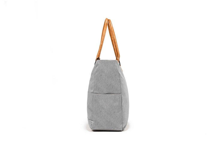 PKG Georgian recycled 33L tote bag, gray fabric with faux leather handles, perfect for travel and daily use.