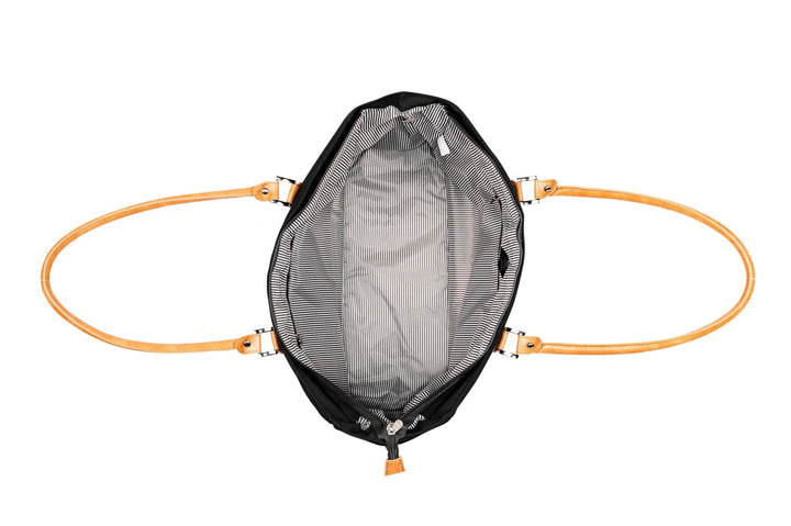 View of the interior of the PKG Georgian 33L tote bag showcasing the striped lining and faux leather straps.