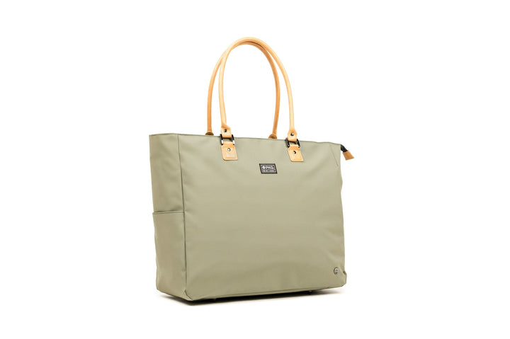 PKG Georgian 33L tote bag in olive green with faux leather accents and sturdy handles.