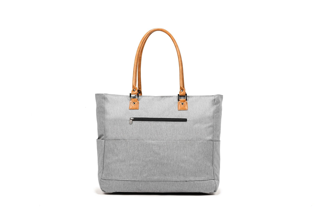 PKG Georgian 33L tote bag with faux leather accents, weather-resistant fabric, and padded base for travel.