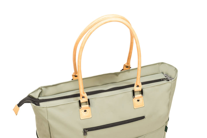 Top view of PKG Georgian Recycled 33L Tote Bag showcasing faux leather accents and sturdy handles.
