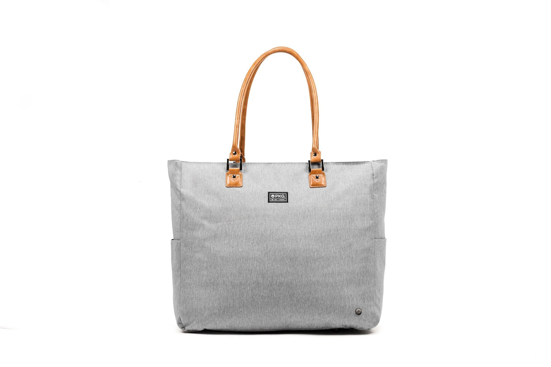 PKG Georgian 33L tote bag in grey with faux leather accents and padded base for travel and overnight trips.