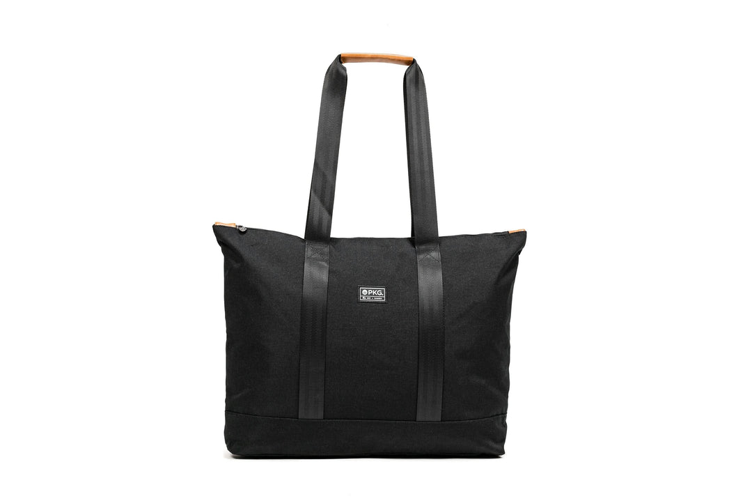 PKG Lawrence 16L tote bag in black with sleek design and sturdy straps, perfect for everyday use.