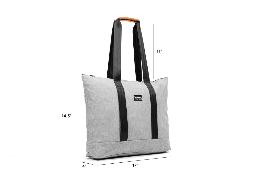 PKG Lawrence 16L tote bag in light grey, dimensions 14.5" x 17" x 4", featuring black straps and weather-resistant fabric.