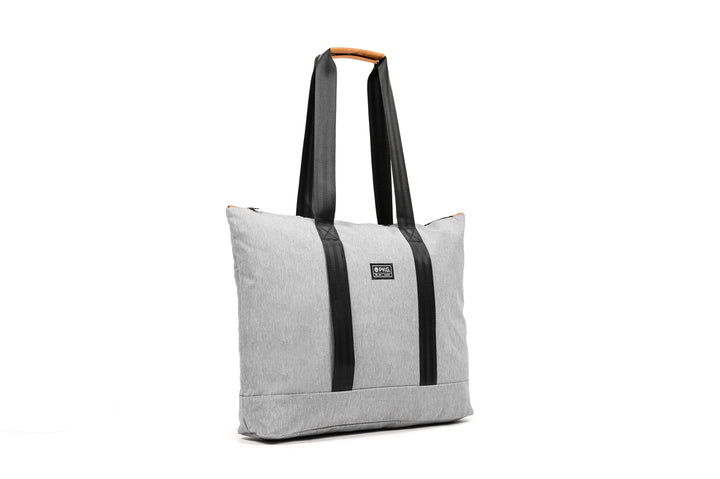 PKG Lawrence 16L tote bag in gray, stylish design with sturdy black straps, perfect for everyday use.
