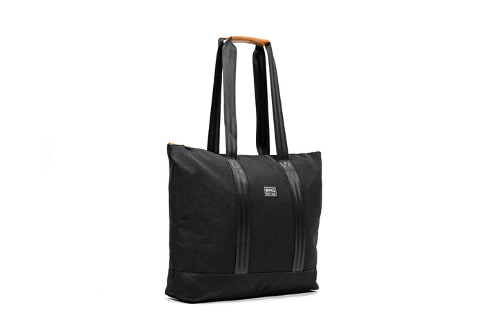 PKG Lawrence 16L tote bag in black, featuring weather-resistant fabric and stylish design for everyday use.