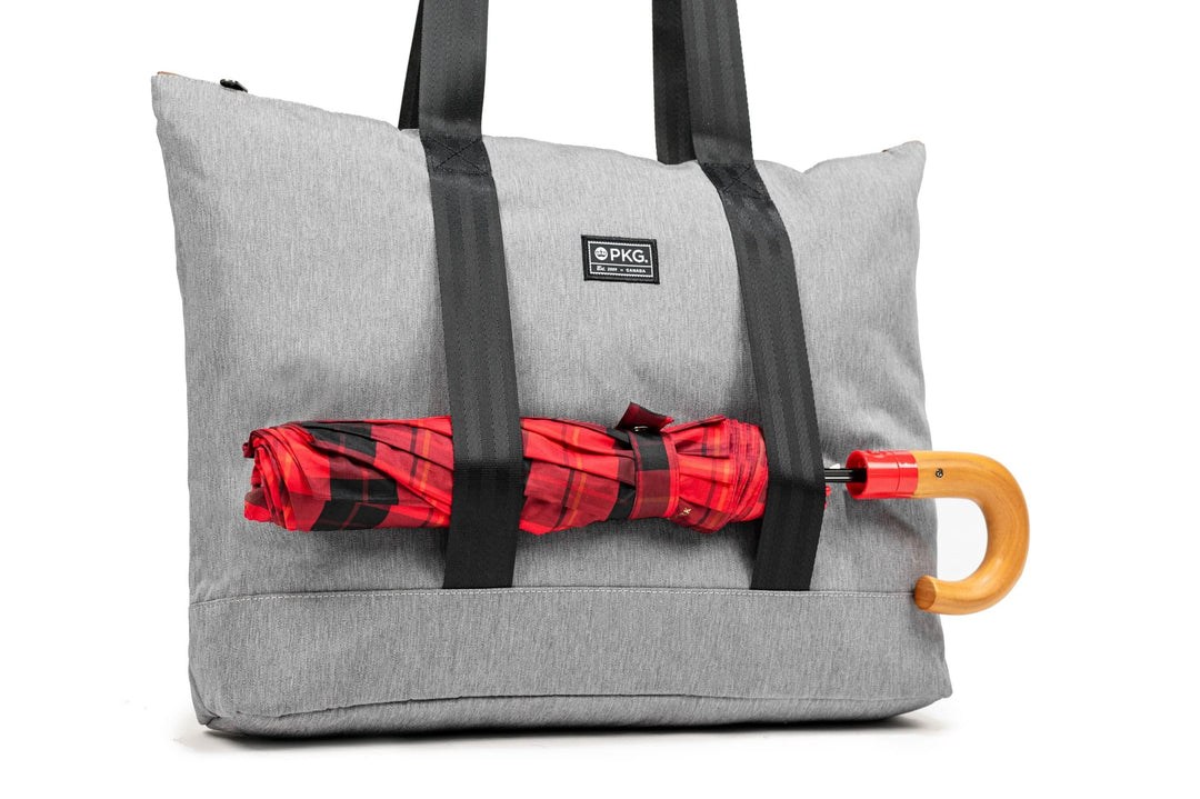 PKG Lawrence 16L tote bag in gray with red umbrella, ideal for everyday carry and weather-resistant.