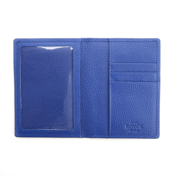 Blue RFID blocking vaccine card passport wallet with clear interior and card slots for storage.