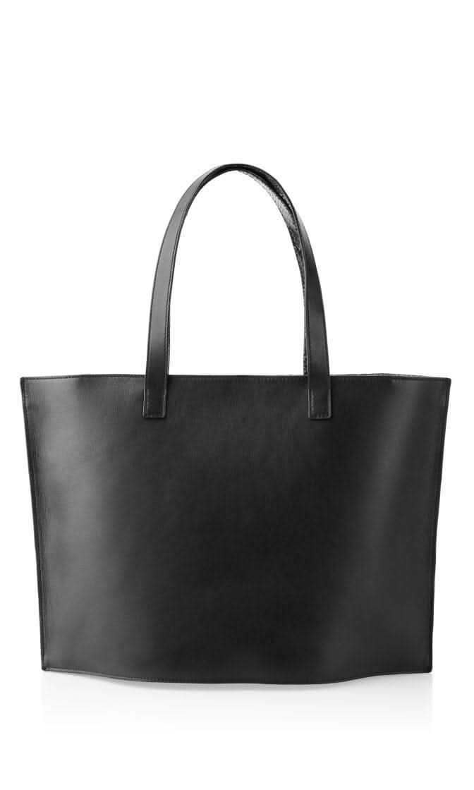 Sac à main en cuir noir avec anses, design épuré et élégant, idéal pour un usage quotidien.