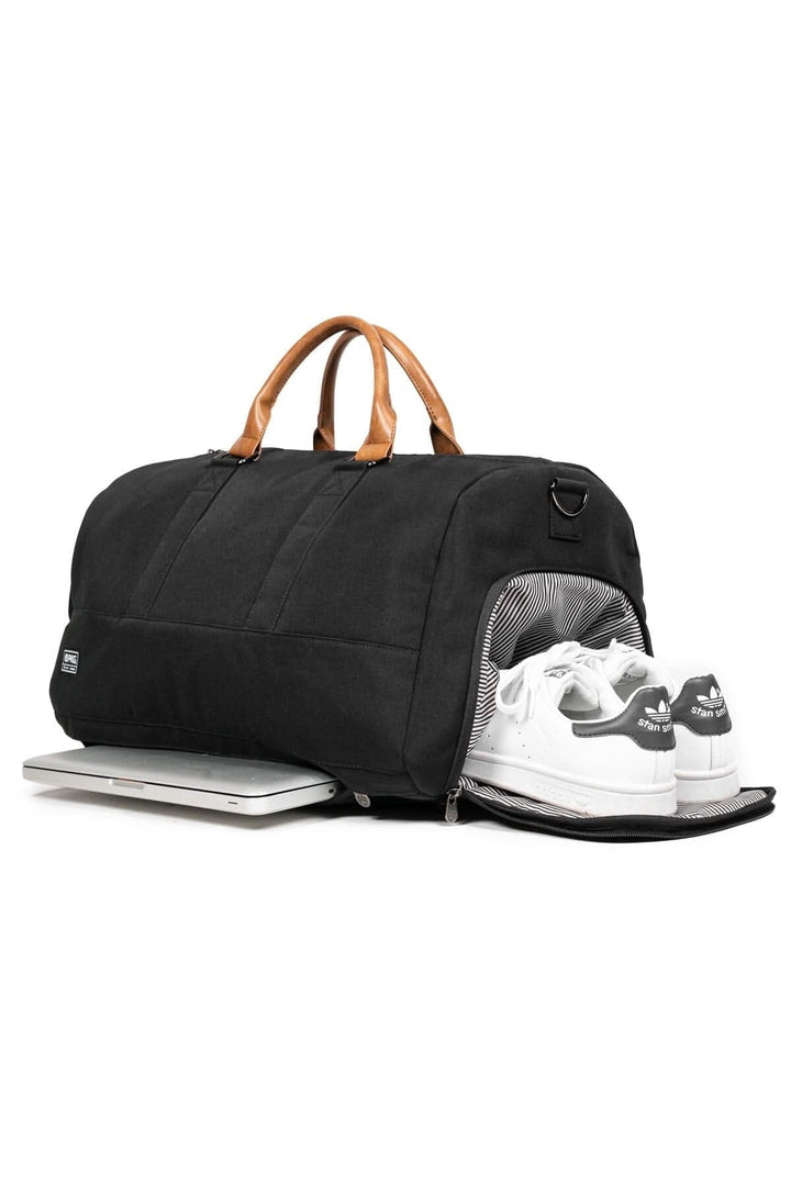 Sac de sport recyclé 42L noir avec compartiment à chaussures et rembourré pour ordinateur portable.