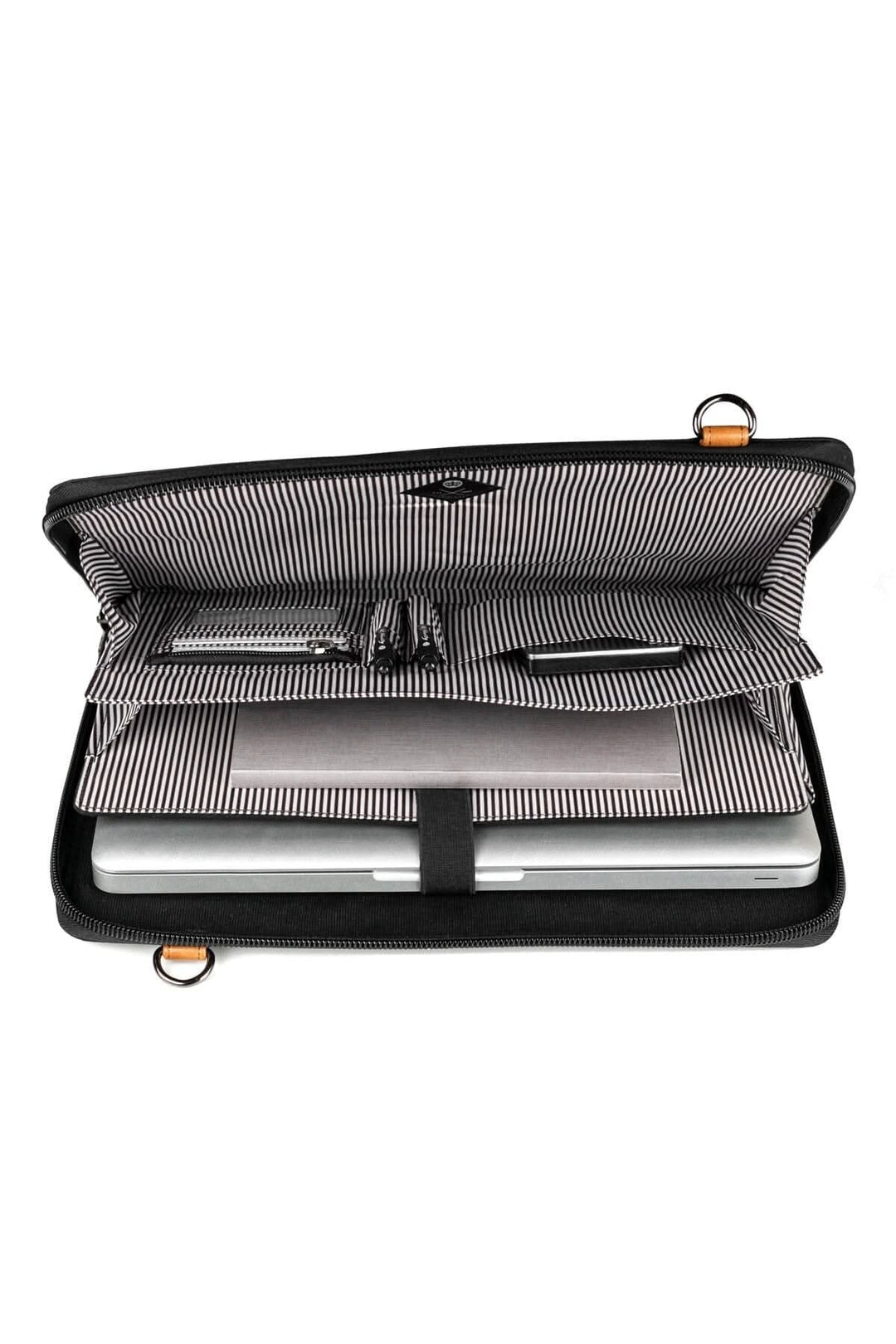 Intérieur du sac messager PKG Wellington 10L avec espace pour ordinateur portable et rangement pratique.