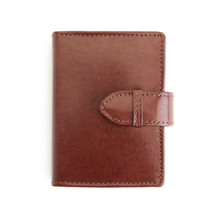 Brown leather card case with belt loop closure for easy access and premium quality craftsmanship.
