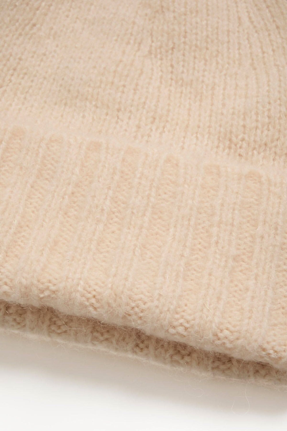 Chapeau douillet Kaleska beige en laine, alpaga et polyamide, parfait pour l'automne.