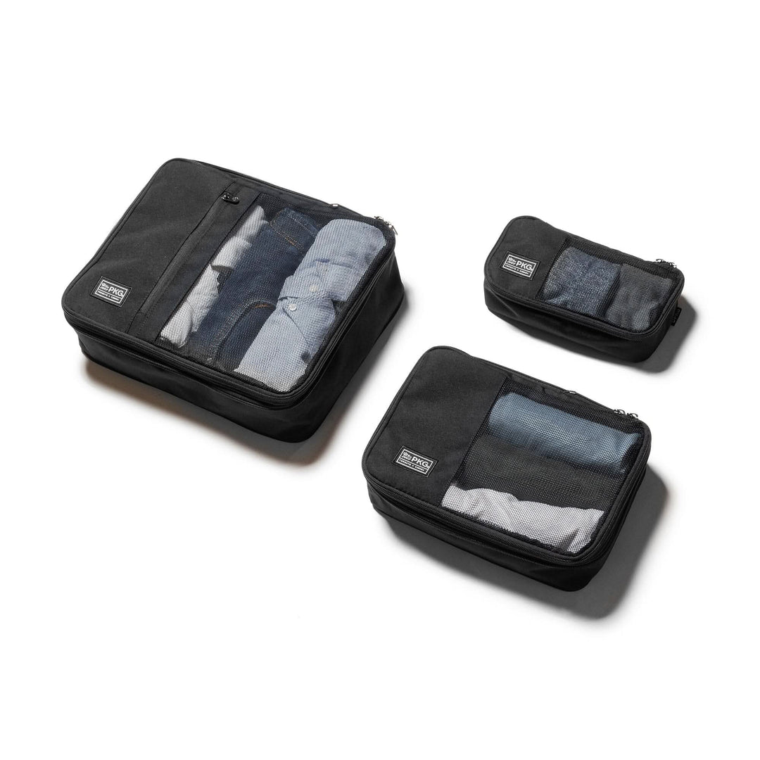 UNION Recycled Compression Packing Cubes set of 3, featuring zippered compression for efficient packing.