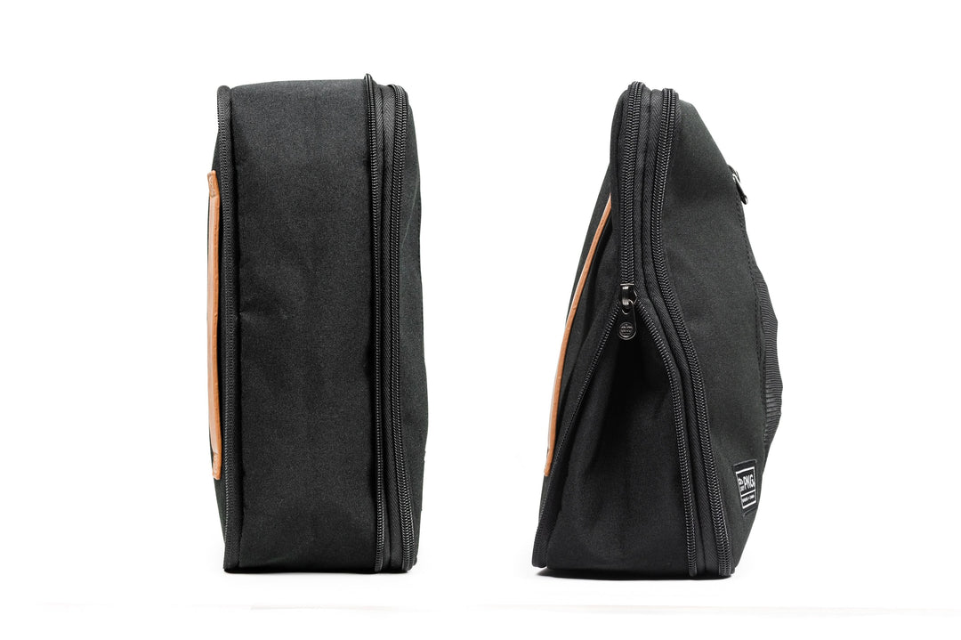 UNION Recycled Compression Packing Cubes in black, showcasing two sizes with zippered compression for efficient packing.
